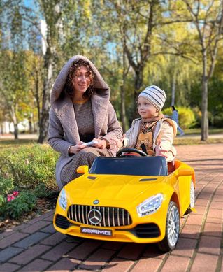 Дитячий електромобіль Mercedes GT Style жовтий