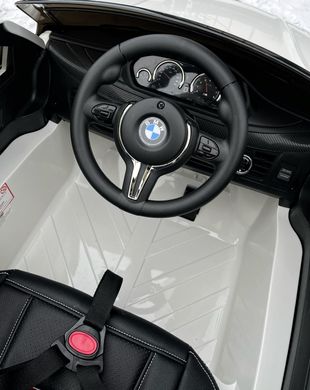 Дитячий електромобіль BMW X6M premium білий