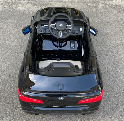 Дитячий електромобіль BMW M5 чорний лак